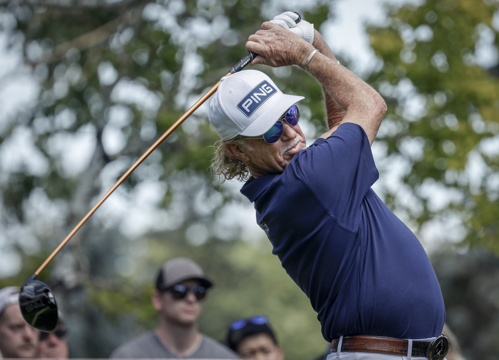 Spain's Miguel Angel Jimenez hits a tee shot on the eighth hole during the final round at the PGA Tour Champions golf tournament in Calgary, Alberta, Sunday, Aug. 17, 2025. (Jeff McIntosh/The Canadian Press via AP)