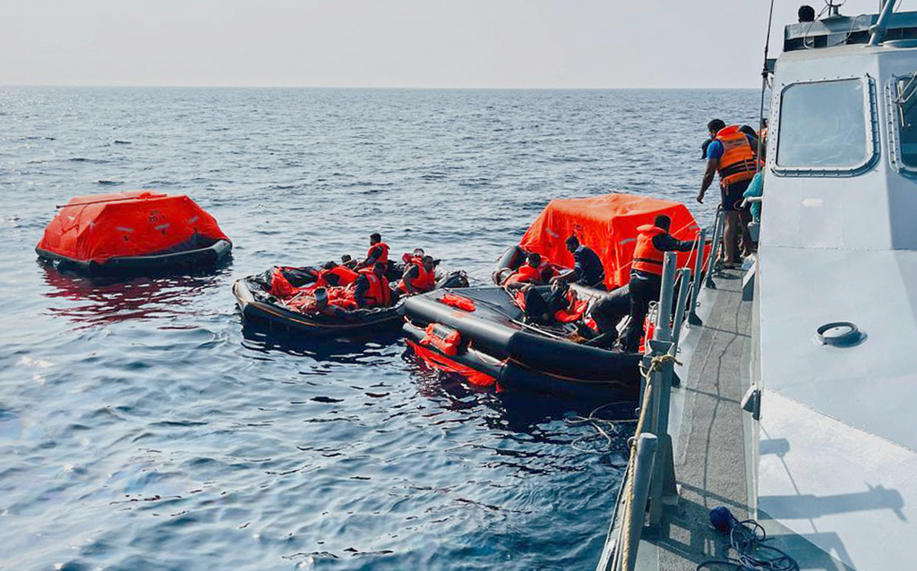 In this photo released by Sri Lankan President Media Division, Sri Lankan Navy sailors rescue Iranian sailors from IRIS Dena warship after their ship sank outside Sri Lanka's territorial waters, near Galle, Sri Lanka, March 4, 2026. (Sri Lankan Presidential Media Division via AP)