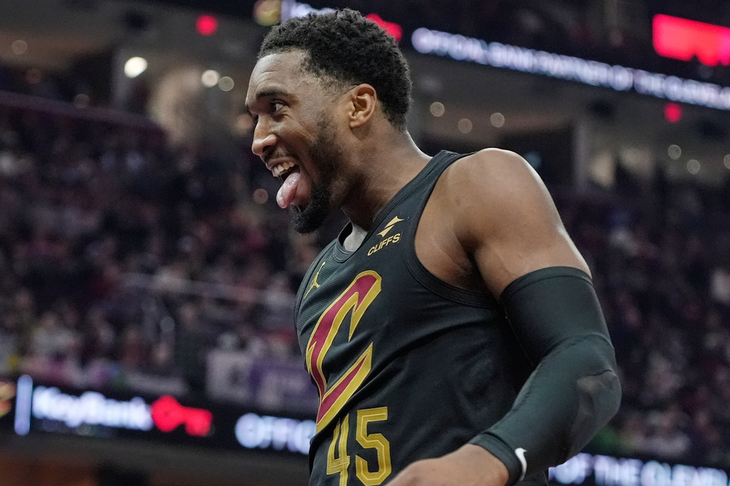 Cleveland Cavaliers guard Donovan Mitchell (45) celebrates in the first half of an NBA basketball game against the Brooklyn Nets in Cleveland, Thursday, Feb. 19, 2026. (AP Photo/Sue Ogrocki)