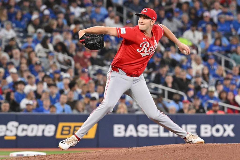 Cincinnati Reds starting pitcher Nick Lodolo throws to a Toronto Blue Jays batter during the first inning of a baseball game in Toronto, Friday, Sept. 25, 2026. (Jon Blacker/The Canadian Press via AP)