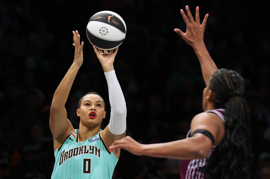FILE - New York Liberty forward Satou Sabally (0) shoots over Toronto Tempo forward Nyara Sabally during the first half of a WNBA basketball game on June 3, 2026, in New York. (AP Photo/Heather Khalifa, File)