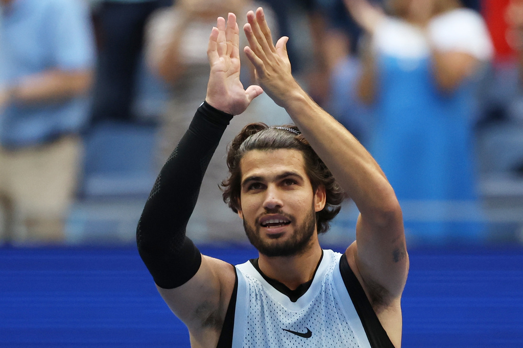 Carlos Alcaraz, of Spain, gestures after he won his match against Tommy Paul, of the United States, during the fourth round of the U.S. Open tennis championships Sunday, Sept. 6, 2026, in New York. (AP Photo/Heather Khalifa)