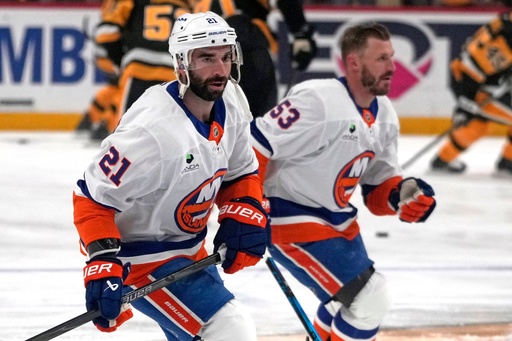 New York Islanders' Casey Cizikas (53), and Kyle Palmieri (21) skate during warm ups before an NHL hockey game against the Pittsburgh Penguins in Pittsburgh, Thursday, Oct. 9, 2025. (AP Photo/Gene J. Puskar) New York Islanders' Casey Cizikas (53), and Kyle Palmieri (21) skate during warm ups before an NHL hockey game against the Pittsburgh Penguins in Pittsburgh, Thursday, Oct. 9, 2025. (AP Photo/Gene J. Puskar)