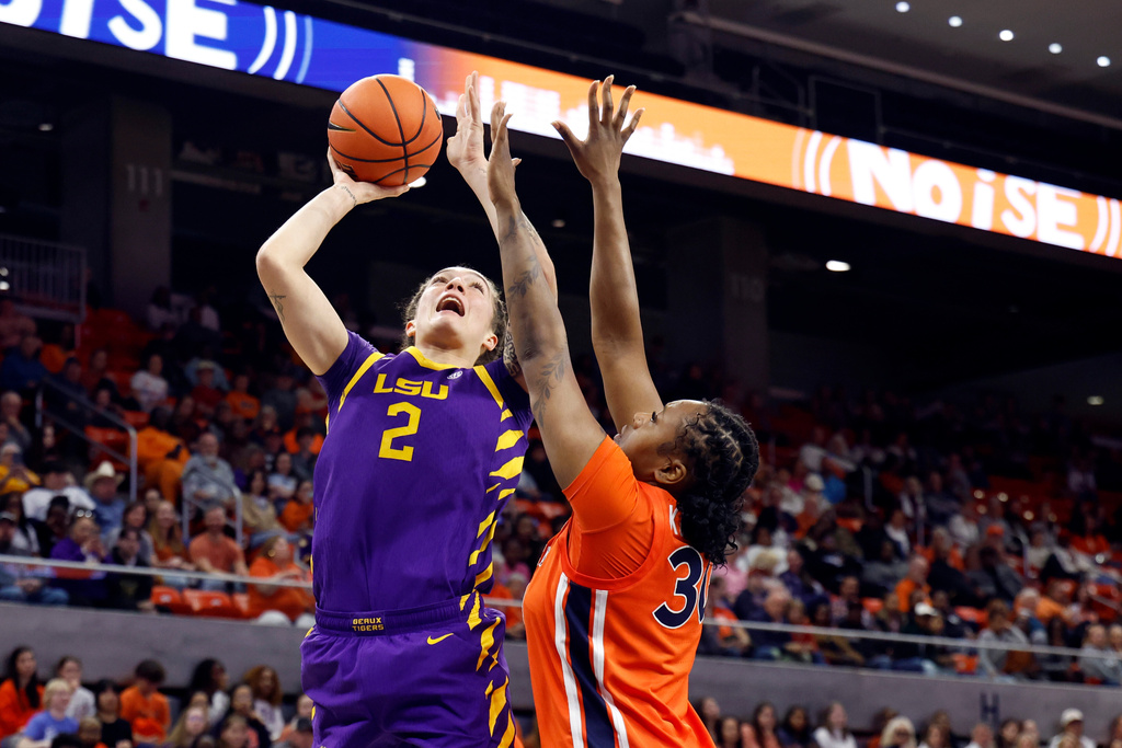 LSU forward Grace Knox (2) looks to shoot as Auburn forward Clara Koulibaly, right, defends during the first half of an NCAA college basketball game Sunday, Feb. 8, 2026, in Auburn, Ala. (AP Photo/Butch Dill)