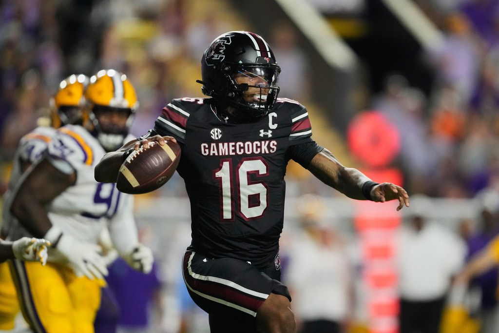South Carolina quarterback Lanorris Sellers (16) scrambles against LSU in the first half of an NCAA college football game, Saturday, Oct. 11, 2025 in Baton Rouge, La. (AP Photo/Gerald Herbert)