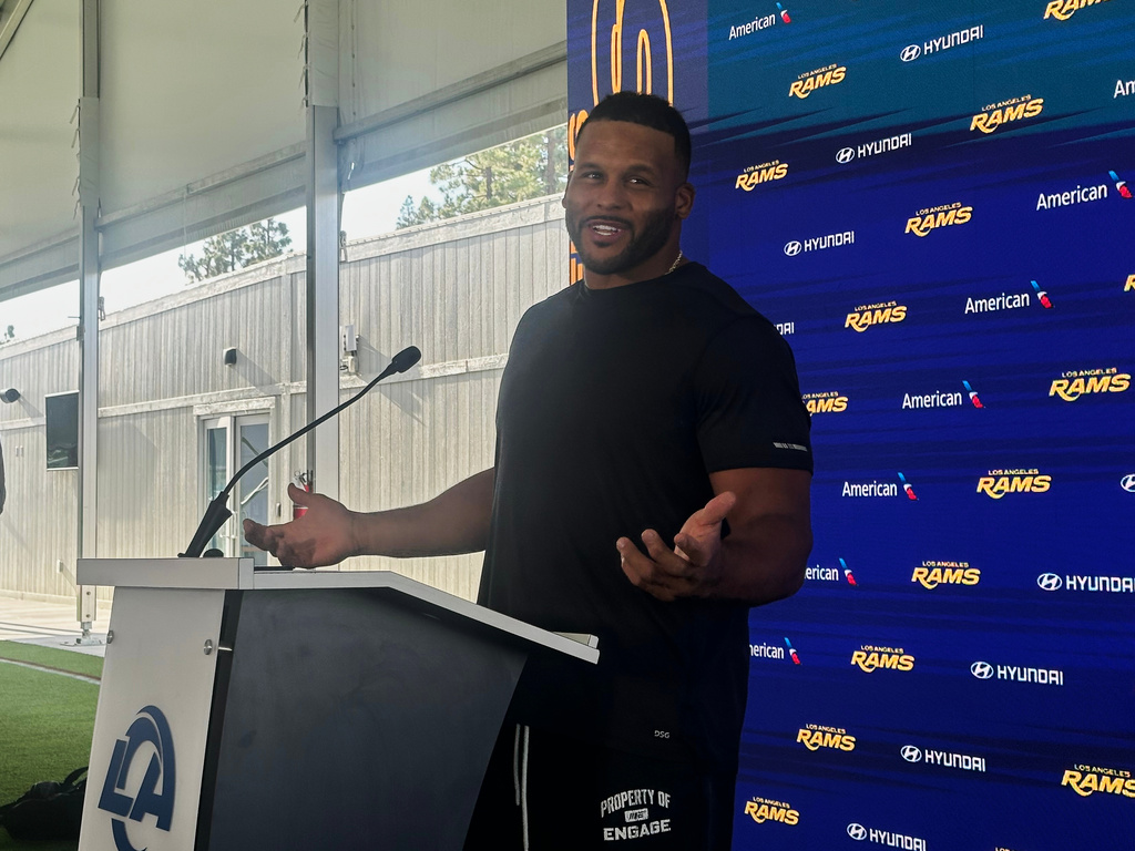 Aaron Donald speaks to the media at the Los Angeles Rams' training complex in Los Angeles, Sunday, Aug. 30, 2026. (AP Photo/Greg Beacham)