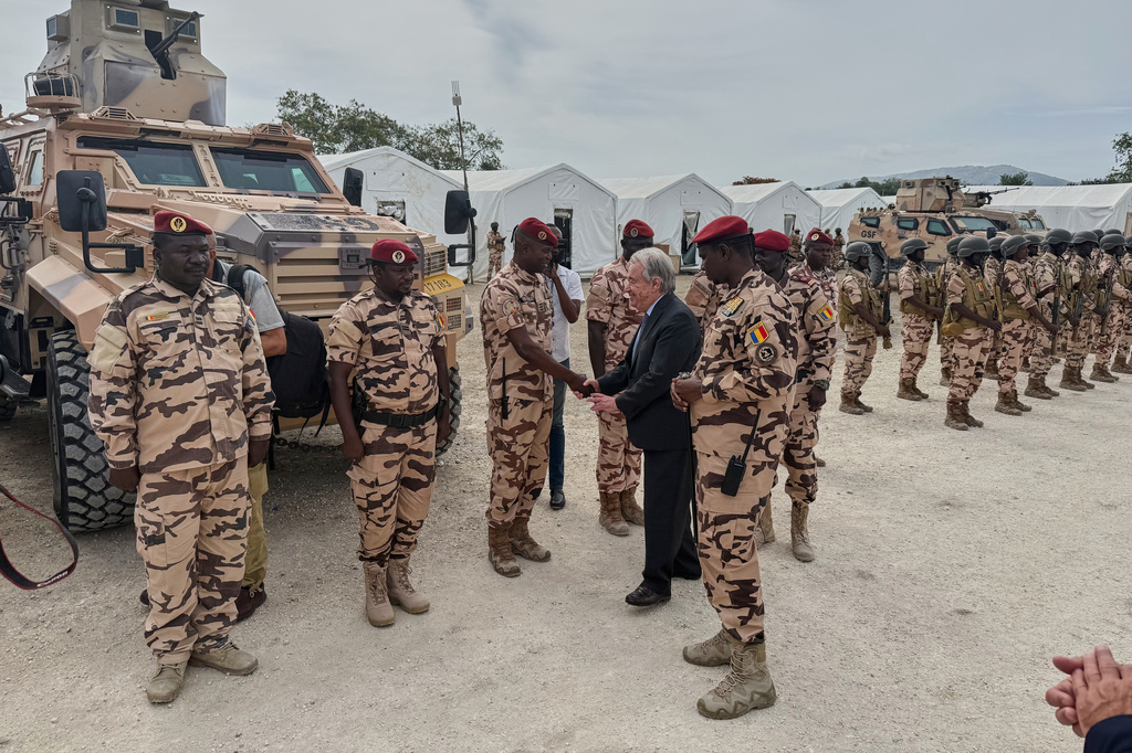 UN Secretary-General Antonio Guterres greets soldiers from Chad at a base in Port-au-Prince, Haiti, Tuesday, June 16, 2026. (AP Photo/Danica Coto)
