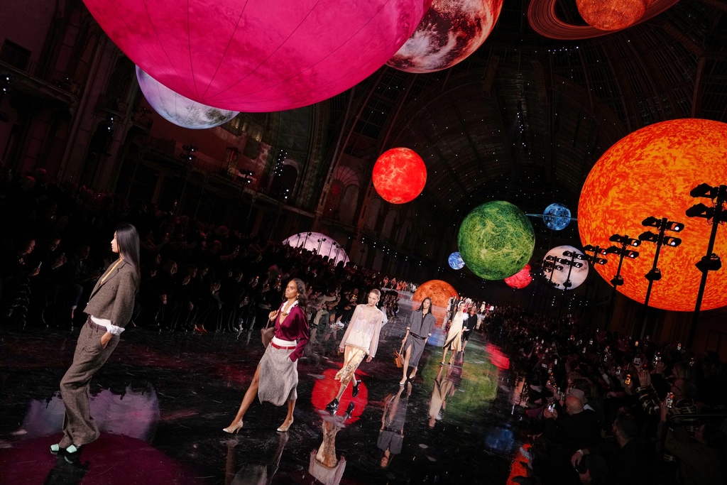 FILE - Models wear creations as part of the Chanel Spring/Summer 2026 collection presented in Paris, Monday, Oct. 6, 2025. (AP Photo/Aurelien Morissard, File)