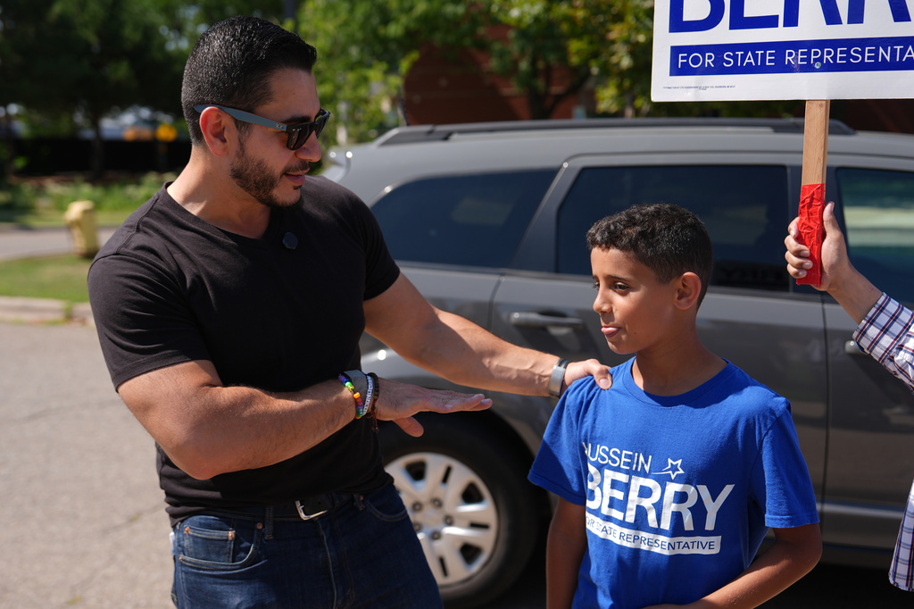 Abdul El-Sayed, a progressive candidate in the Democratic primary for U.S. Senate in Michigan, visits a polling place at Salina Intermediate School on primary election day, Tuesday, Aug. 4, 2026, in Dearborn, Mich. (AP Photo/Julia Demaree Nikhinson)