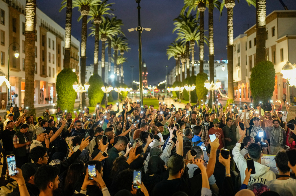 People take part in a youth-led protest against corruption and calling for education and healthcare reforms, in Rabat, Morocco, Thursday, Oct. 9, 2025. (AP Photo/Mosa'ab Elshamy)