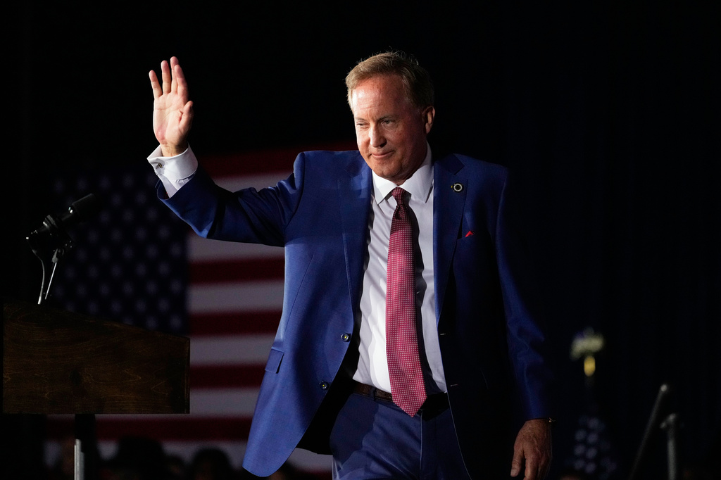 Texas Attorney General Ken Paxton, a Republican candidate for the U.S. Senate, waves as he takes the stage to speak during a primary runoff election night event after winning the Republican party's nomination Tuesday, May 26, 2026, in Plano, Texas. (AP Photo/Tony Gutierrez)