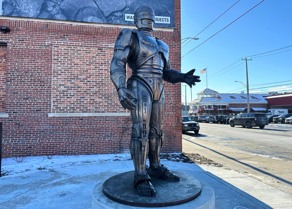 A statue of RoboCop stands outside a business in Detroit's Eastern Market area, Thursday, Dec. 4, 2025. (AP Photo/Mike Householder)
