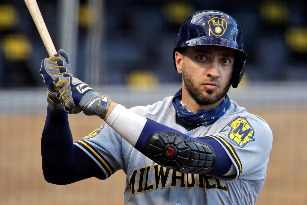 FILE - Milwaukee Brewers' Ryan Braun warms up on deck during the first inning of a baseball game against the Pittsburgh Pirates in Pittsburgh, July 28, 2020. (AP Photo/Gene J. Puskar, File)