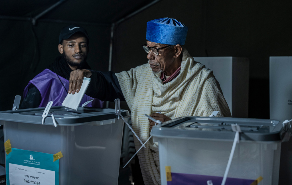 A voter casts a ballot at a polling station during the general election in Addis Ababa, Ethiopia, Monday, June 1, 2026. (AP Photo/Amanuel Sileshi)
