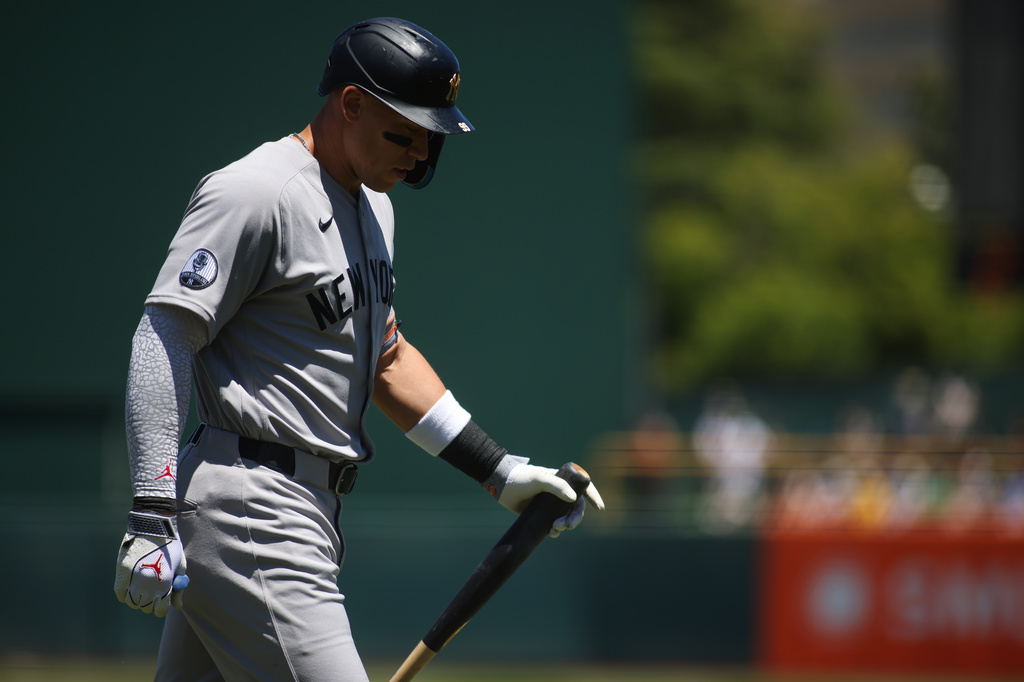 New York Yankees' Aaron Judge walks back to the dugout after being called out on strikes during the first inning of a baseball game against the Athletics, Sunday, May 31, 2026, in West Sacramento, Calif. (AP Photo/Scott Marshall)