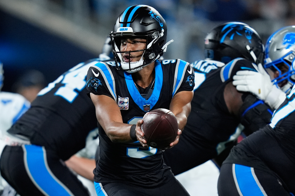 Carolina Panthers quarterback Bryce Young (9) passes the ball during an NFL football game against the Detroit Lions in Charlotte, N.C., Sunday, Oct. 4, 2026. (AP Photo/Erik Verduzco)