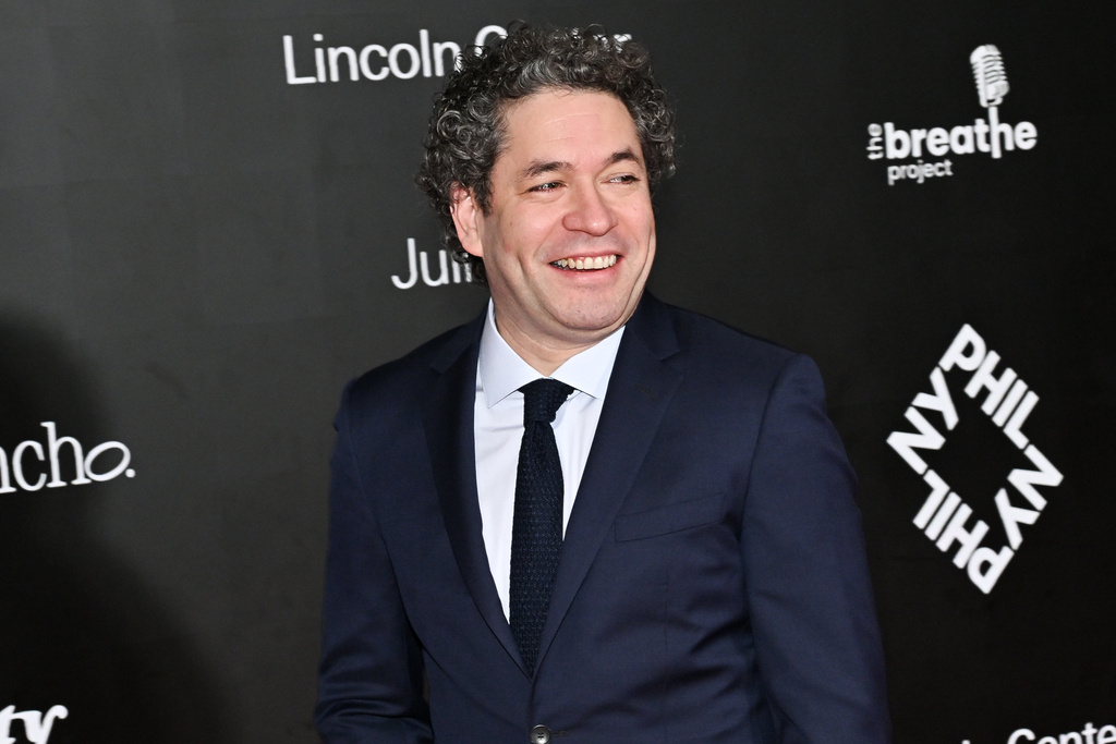 FILE - New York Philharmonic music and artistic director Gustavo Dudamel appears at a special screening of "El Canto de las Manos" in New York on Nov. 7, 2025. (Photo by Evan Agostini/Invision/AP, File)