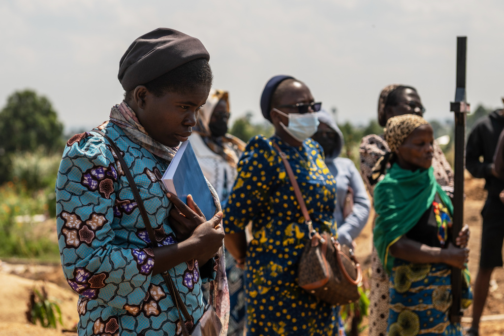 Catholic nuns from the orphanage where Vanisa Anifa, a 6-month-old orphaned girl who died of Ebola, was staying, attends her funeral in Bunia, Congo, Friday, June 19, 2026. (AP Photo/Moses Sawasawa)