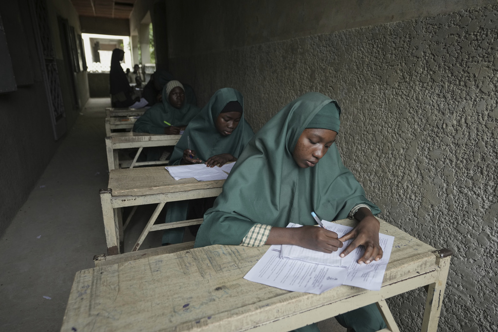 Students of the Future Prowess Islamic Foundation School take a terminal exam, in Maiduguri, Nigeria, Thursday, July 24, 2025. (AP Photo/Sunday Alamba)