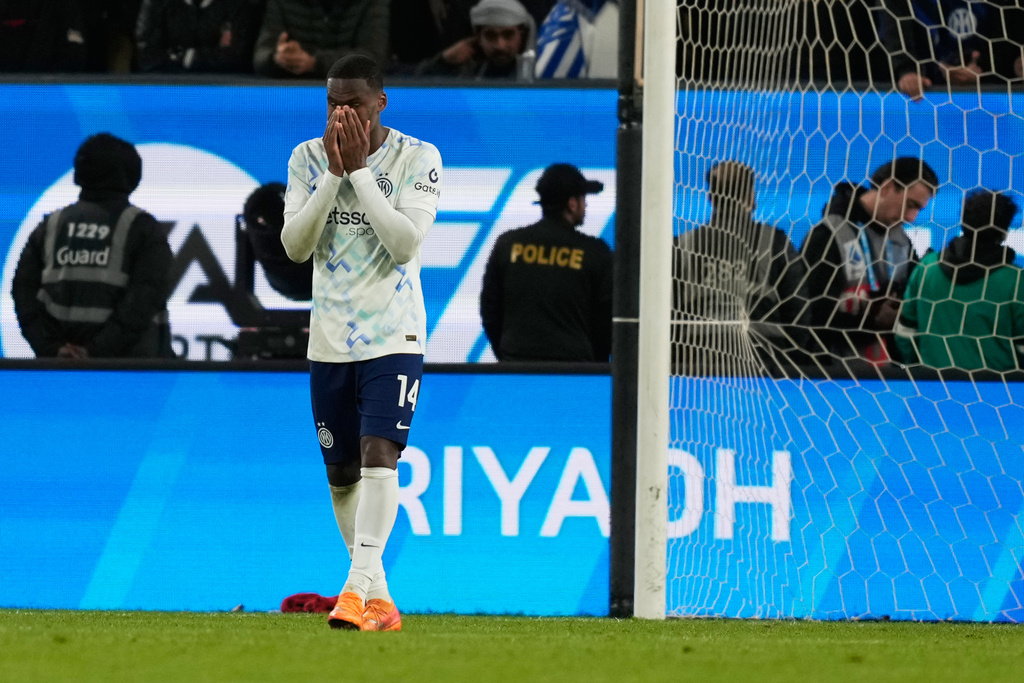Inter Milan's Ange-Yoan Bonny reacts after missing to score during a penalty shoot out during an Italian Super Cup semi-final soccer match between Bologna and Inter Milan in Riyadh, Saudi Arabia, Friday, Dec. 19, 2025. (AP Photo/Altaf Qadri)