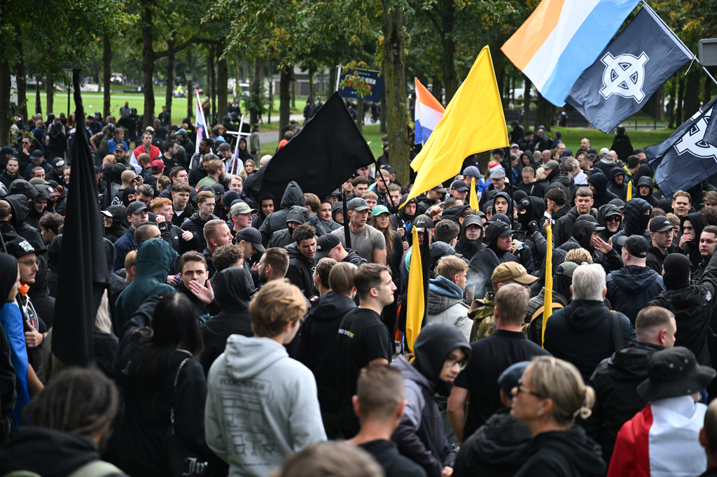 Protesters attend a far-right groups' protest against immigration and asylum policies, in The Hague, Netherlands, Saturday, Sept. 19, 2026. (AP Photo/Mouneb Taim)