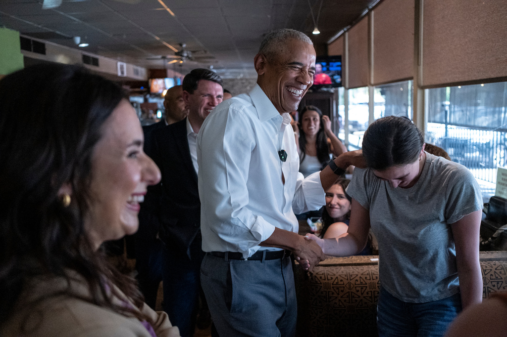 Texas Democratic gubernatorial candidate Gina Hinojosa, Texas Democratic Senate candidate and Texas state Rep. James Talarico, and former President Barack Obama visit the Taco Joint on Tuesday, May 12, 2026, in Austin, Texas. (AP Photo/Joel Angel Juarez, Pool)