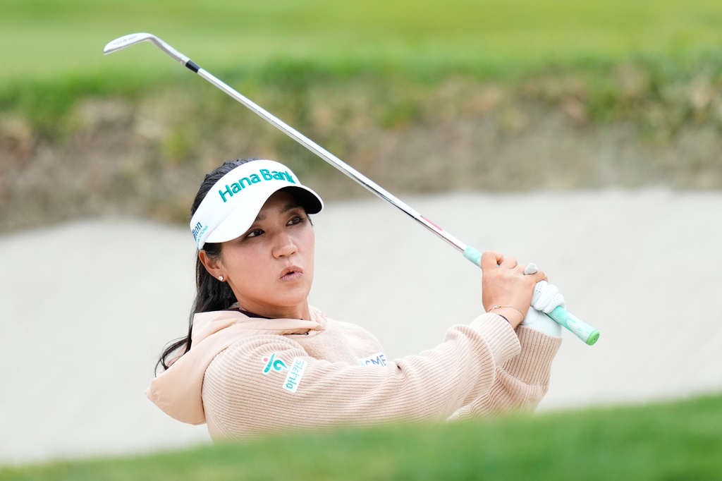 Lydia Ko, of New Zealand, reacts after hitting out of a bunker on the 14th hole during a practice round ahead of the U.S. Women's Open golf tournament Tuesday, June 2, 2026, in the Pacific Palisades area of Los Angeles. (AP Photo/Ashley Landis)