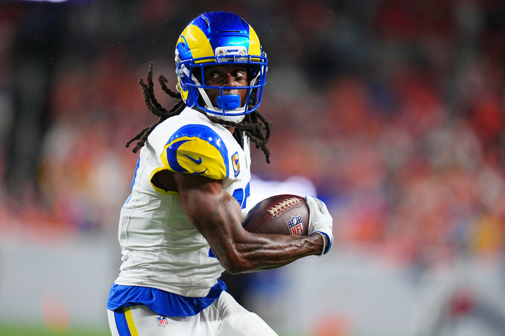 Los Angeles Rams wide receiver Davante Adams catches a pass against the Denver Broncos during the first half of an NFL football game Sunday, Sept. 27, 2026, in Denver. (AP Photo/Jack Dempsey)
