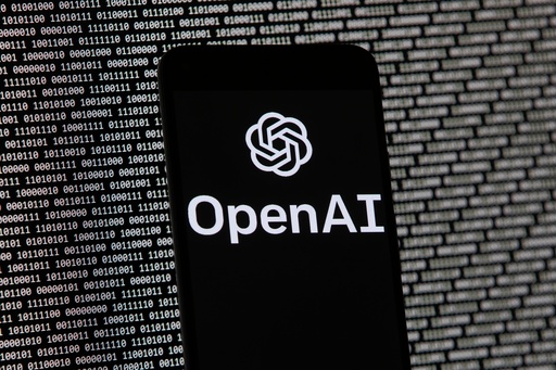 FILE - The OpenAI logo appears on a mobile phone in front of a computer screen with random binary data, March 9, 2023, in Boston. (AP Photo/Michael Dwyer, File) FILE - The OpenAI logo appears on a mobile phone in front of a computer screen with random binary data, March 9, 2023, in Boston. (AP Photo/Michael Dwyer, File)