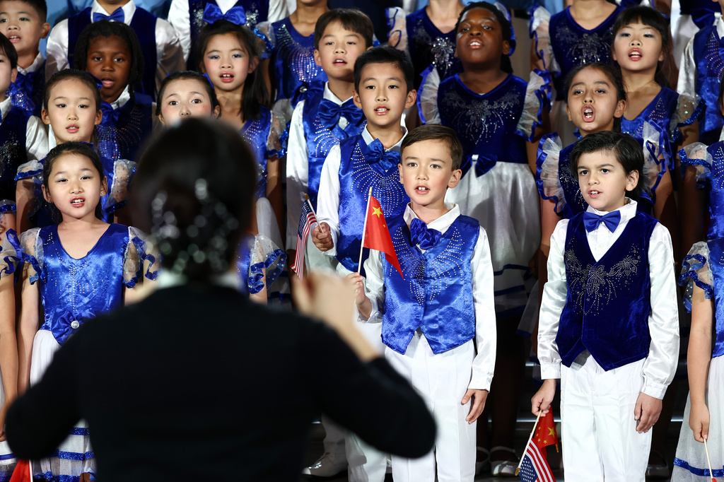 Choir students from the Hope Chinese School perform for first lady of China Peng Liyuan and first lady Melania Trump during a visit to the Smithsonian's National Museum Of Asian Art, Thursday, Sept. 24, 2026, in Washington. (Finn Gomez/Pool Photo via AP)