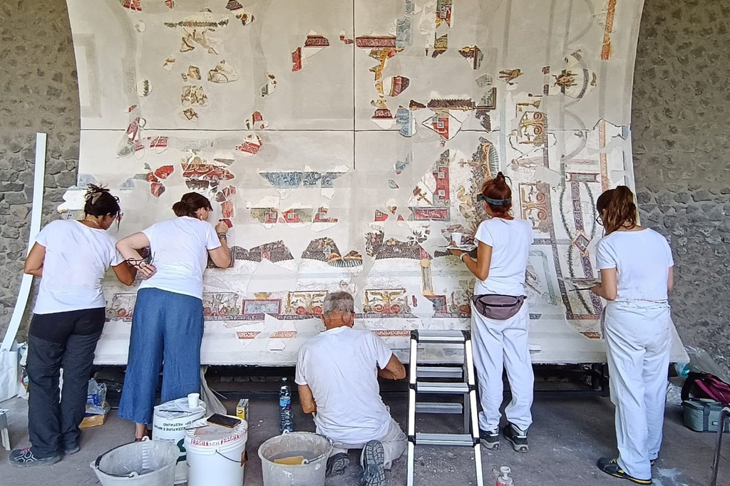 In this picture made available by the Archaeological Park of Pompeii, Friday, July 24, 2026, part of the restored ceiling of the Bakery House is displayed at the Pompeii Archaeological site. (Parco Archeologico di Pompei via AP)