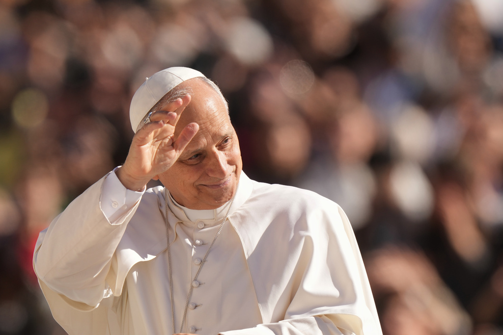 Pope Leo XIV arrives in St. Peter's Square for his weekly general audience, at the Vatican, Wednesday, Oct. 8, 2025. (AP Photo/Andrew Medichini)