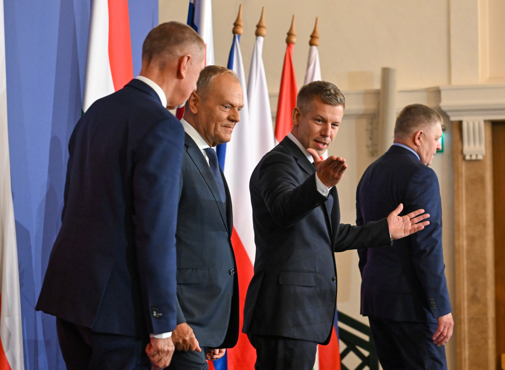 From left, Czech Republic's Premier Andrej Babis, Poland's Premier Donald Tusk, Hungary's Premier Peter Magyar and Slovakia's Premier Robert Fico arrive for a press conference to conclude the one-day the summit of the Visegrad Group (V4) countries in the Royal Castle in Godollo, northern Hungary, Tuesday, June 23, 2026. (Tibor Illyes/MTI via AP)