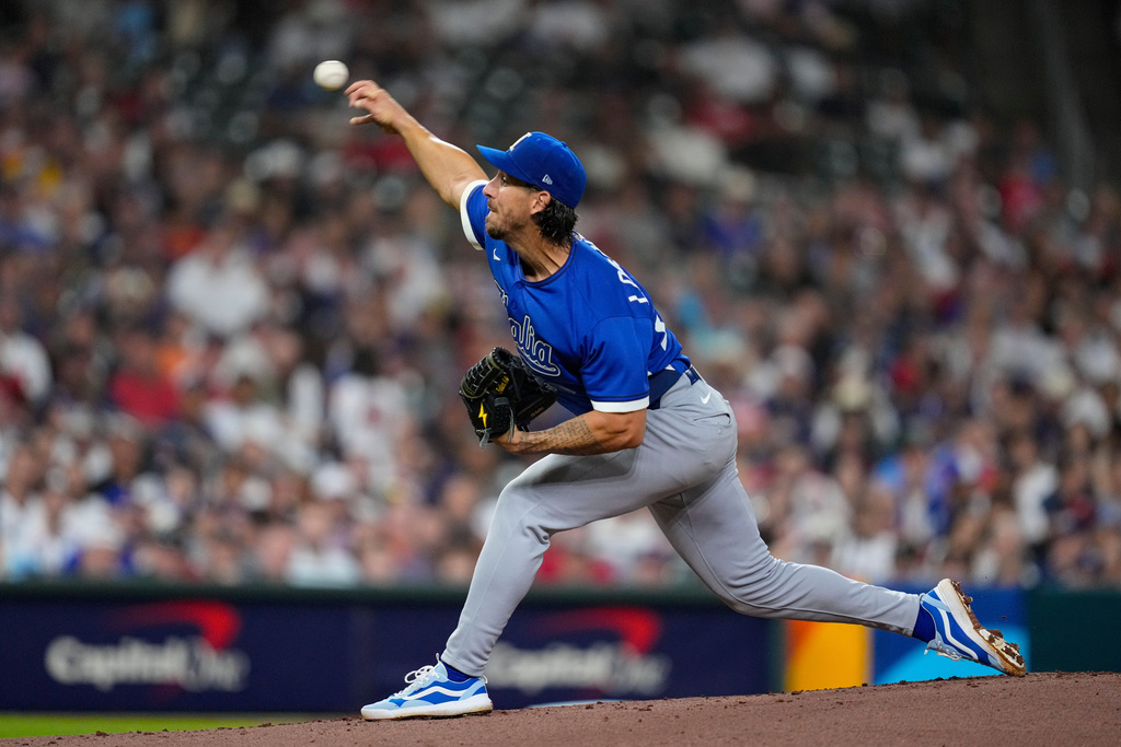 Italy pitcher Michael Lorenzen (24) throws to the United States in the first inning of a World Baseball Classic game, Tuesday, March 10, 2026, in Houston. (AP Photo/Ashley Landis)