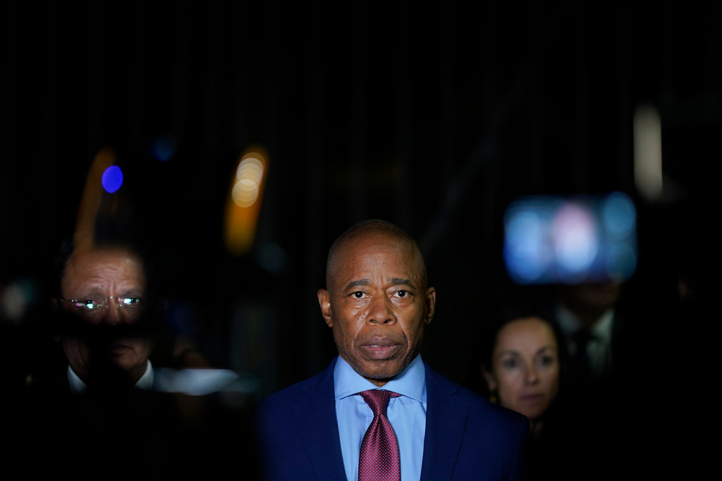 FILE - New York City Mayor Eric Adams talks to the press in front of the Basilica of Our Lady of Guadalupe, Oct. 4, 2023, in Mexico City. (AP Photo/Eduardo Verdugo, File)