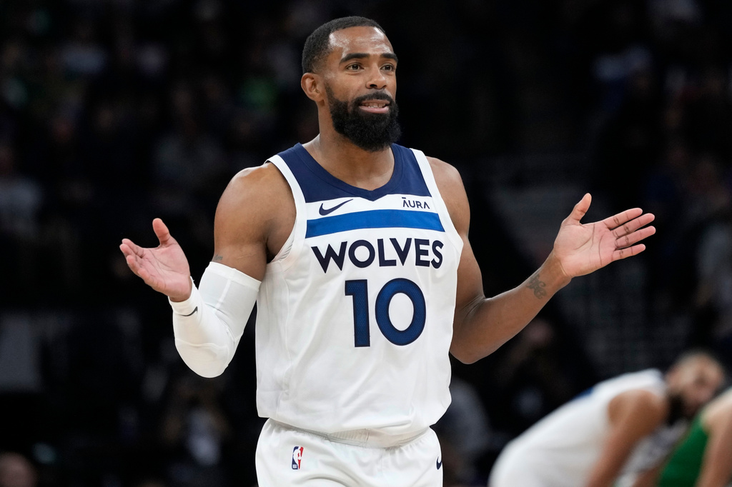 FILE - Minnesota Timberwolves guard Mike Conley reacts during the second half of an NBA basketball game against the Boston Celtics, Nov. 6, 2023, in Minneapolis. (AP Photo/Abbie Parr, File)