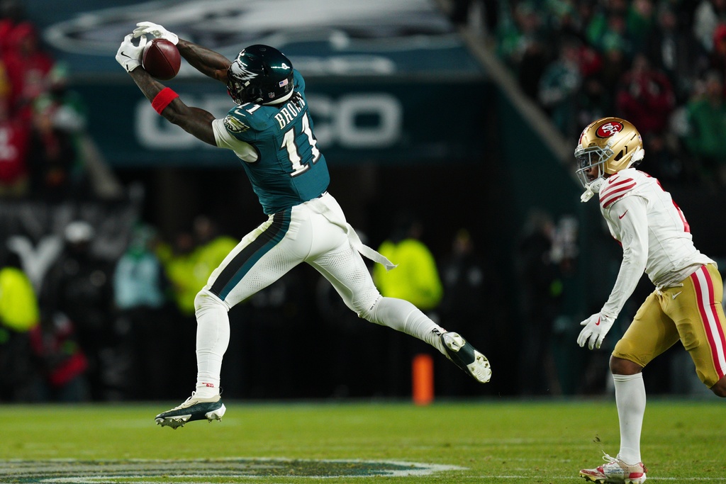 Philadelphia Eagles wide receiver A.J. Brown (11) catch make the catch during the second half of an NFL wild-card playoff football game against the San Francisco 49ers on Sunday, Jan. 11, 2026, in Philadelphia. (AP Photo/Derik Hamilton)
