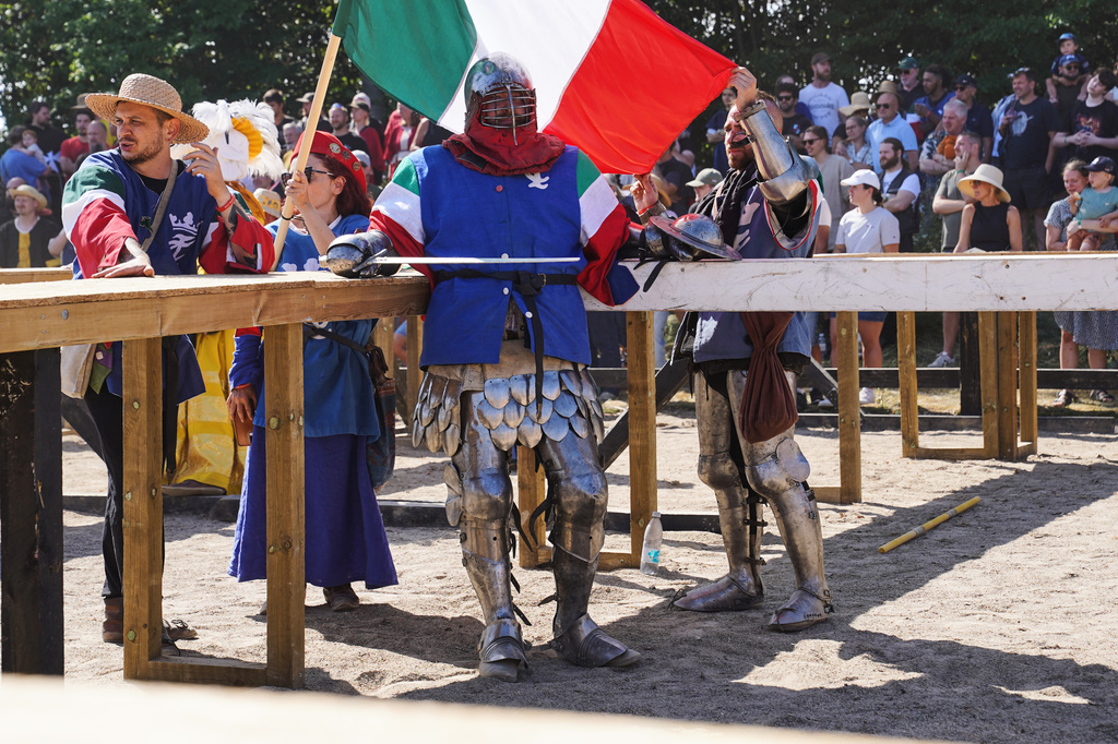 A fighter from Italy awaits a battle at the International Medieval Combat Federation's World Championship at Spottrup Castle, in Spottrup, Denmark, Thursday, July 23, 2026. (AP Photo/James Brooks)