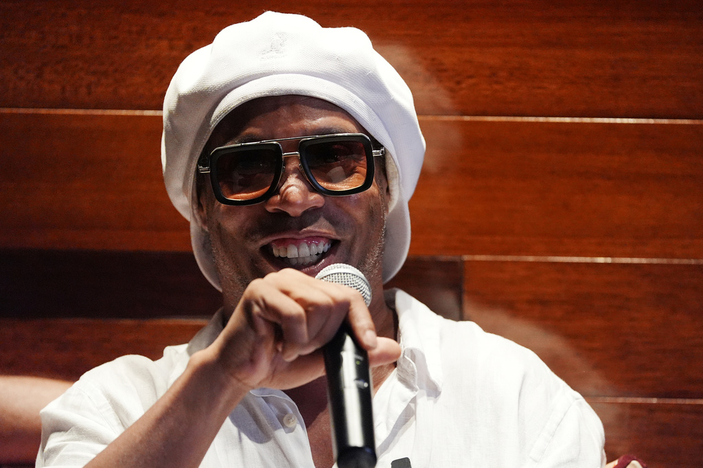Brazilian football legend Ronaldinho speaks during a media event celebrating his recent signing with Italian soccer club Ravenna FC, at Cipriani Downtown Miami restaurant, Tuesday, June 23, 2026, in Miami. (AP Photo/Rebecca Blackwell)