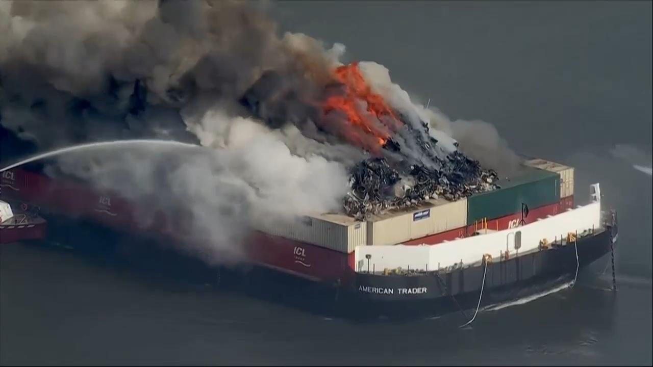 Massive fire breaks out aboard scrap metal barge on Delaware Bay