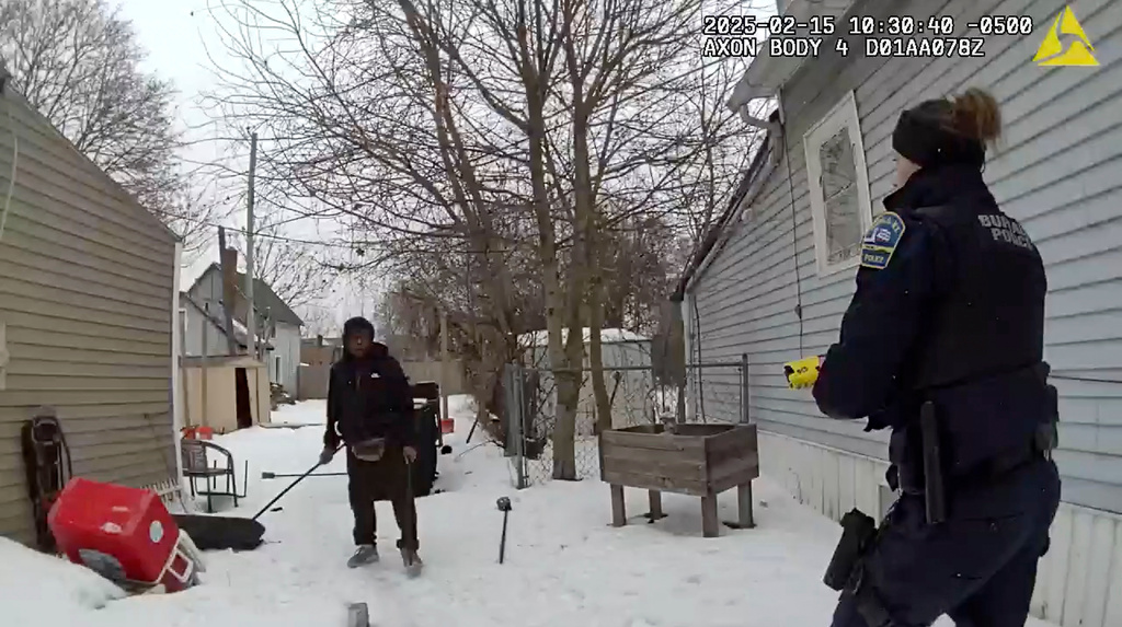 This image from body camera video provided by the Buffalo Police Department shows Nurul Amin Shah Alam, left, as he is approached by Buffalo Police officers in Buffalo, N.Y., on Feb. 15, 2025. (Buffalo Police Department via AP)