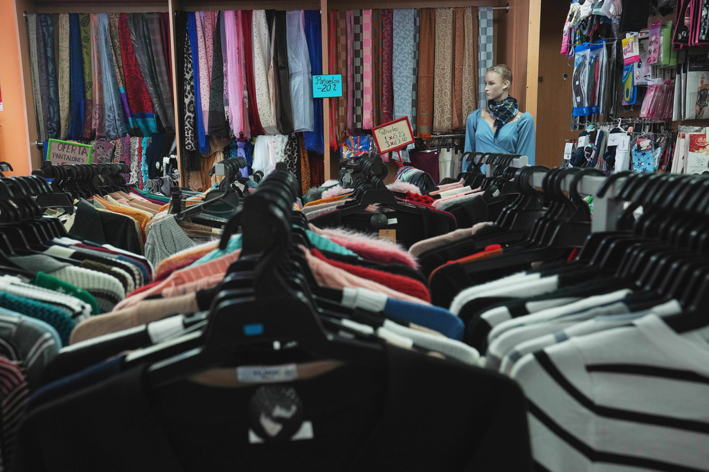 Clothing imported from China is on display for sale at a store in Quito, Ecuador, Saturday, Jan. 31, 2026. (AP Photo/Dolores Ochoa)