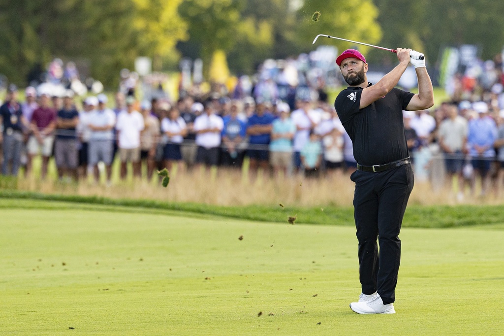 Captain Jon Rahm, of Legion XIII, hits on the 18th hole during the final round of LIV Golf Team Championship Michigan at The Cardinal at Saint John's, Sunday, Aug. 24, 2025, in Plymouth, Mich. (Scott Taetsch/LIV Golf via AP)
