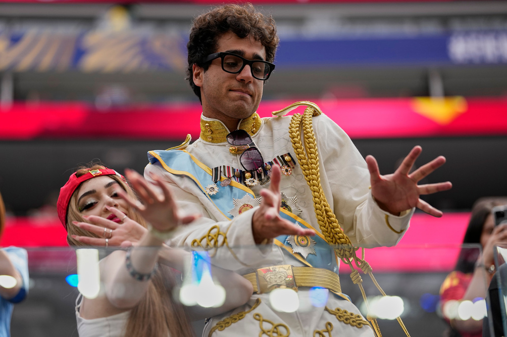 Iranian fans attend ahead of the World Cup Group G soccer match between Belgium and Iran in Inglewood, Calif., near Los Angeles, Sunday, June 21, 2026. (AP Photo/Gregory Bull)