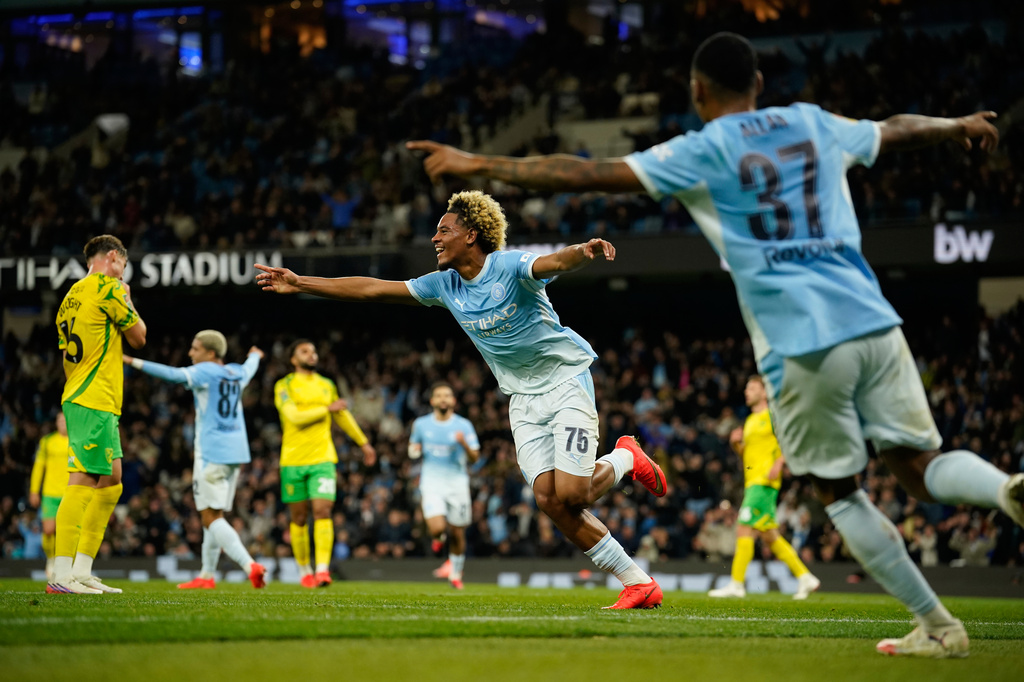 Manchester City's Floyd Samba celebrates after scoring first goal during the third-round English League Cup soccer match between Manchester City and Norwich City in Manchester, England, Thursday, Sept. 17, 2026. (AP Photo/Dave Thompson
