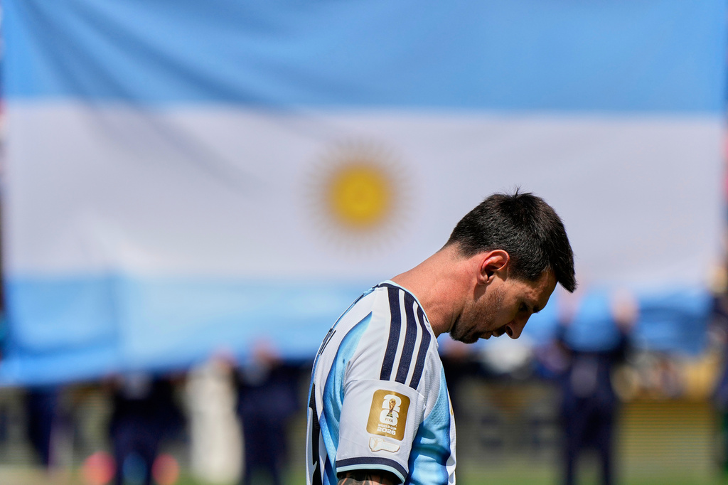 Argentina's Lionel Messi walks across the pitch before the World Cup final soccer match between Spain and Argentina in East Rutherford, N.J., near New York, Sunday, July 19, 2026. (AP Photo/Ashley Landis)