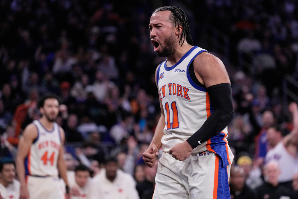 New York Knicks' Jalen Brunson reacts after drawing a foul during the first half of an NBA basketball game against the San Antonio Spurs Sunday, March 1, 2026, in New York. (AP Photo/Seth Wenig)