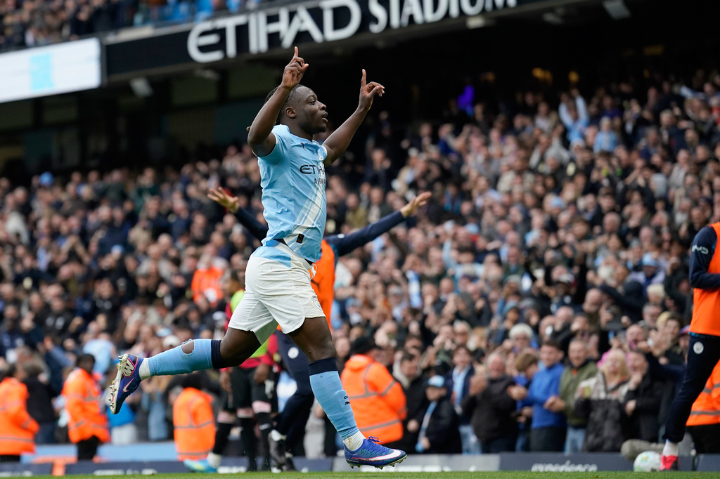 Manchester City's Jeremy Doku celebrates after scoring the opening goal during the English Premier League soccer match between Manchester City and Brentford in Manchester, Saturday, May 9, 2026. (AP Photo/Dave Thompson)