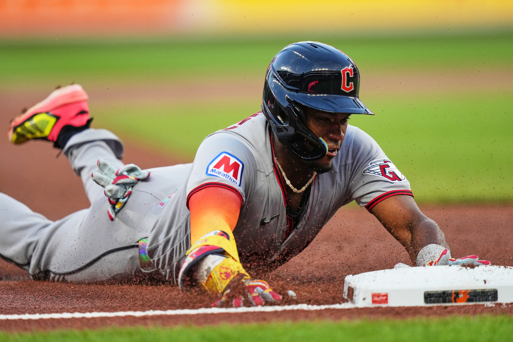 Cleveland Guardians' Angel Martínez slides into third base after hitting a triple during the second inning of a baseball game against the Baltimore Orioles, Tuesday, Sept. 8, 2026, in Baltimore. (AP Photo/Stephanie Scarbrough)