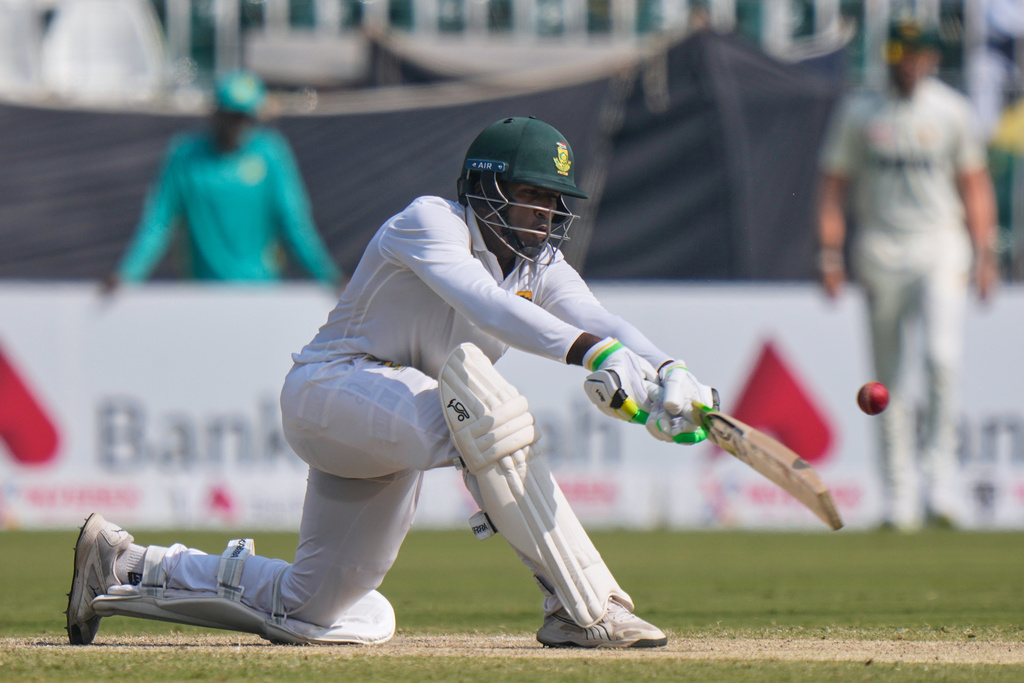 South Africa's Senuran Muthusamy plays a shot during the third day of the second test cricket match between Pakistan and South Africa, in Rawalpindi, Pakistan, Wednesday, Oct. 22, 2025. (AP Photo/Anjum Naveed)